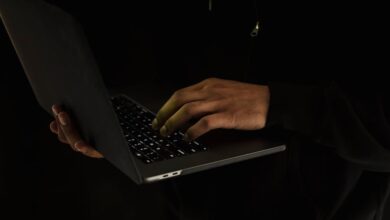 A man browsing his laptop